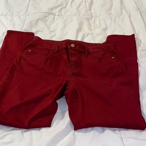 Burgundy rock star mid rise jeans